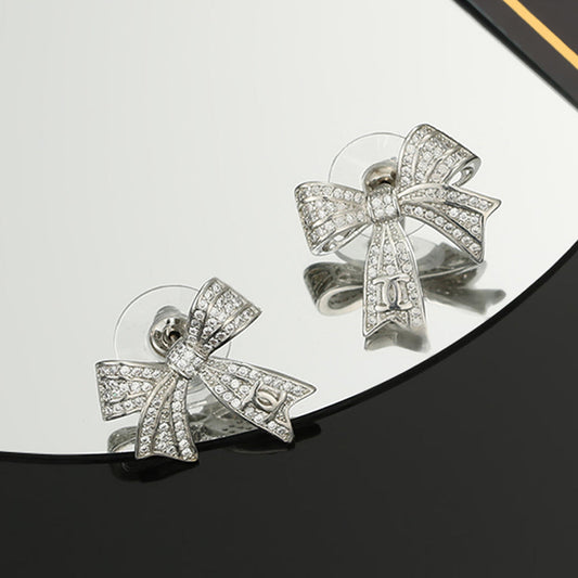 18K  Chanel Bow Tie Diamond Earrings